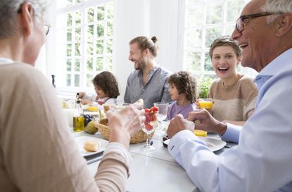 family at the dinner table talking about organ donation