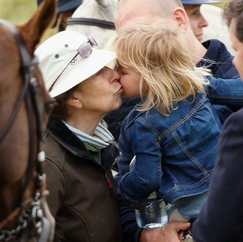 Princess Anne kissing Mia Tindall