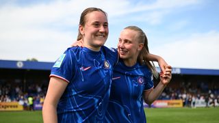 Wieke Kaptein and Aggie Beever-Jones of Chelsea celebrate following their team's victory in The Adobe Women's FA Cup Semi Final match between Chelsea and Liverpool