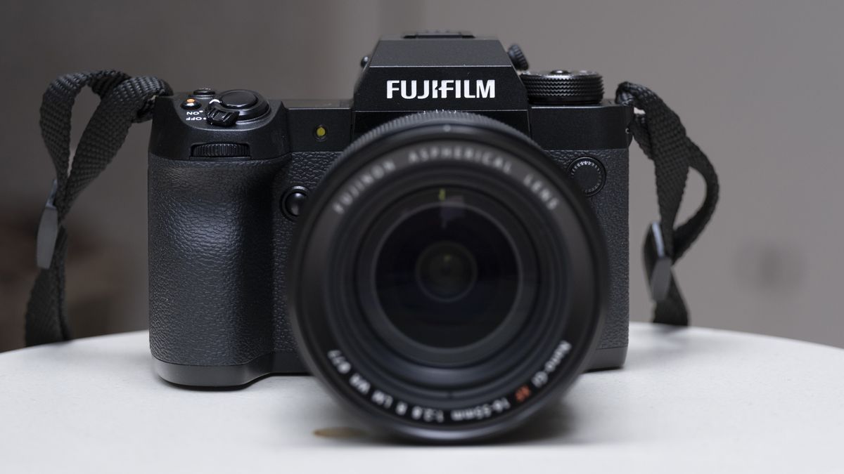 The Fujifilm X-H2 camera setting on a white table