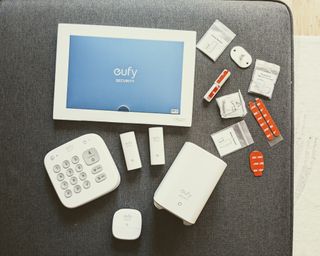eufy alarm kit components laid out side by side in writer's home