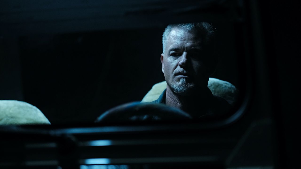 eric dane in a dark car at night in euphoria