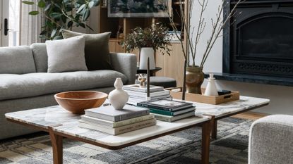 a coffee table with decor ontop