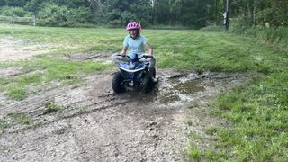 Girl drives Droyd Fury ATV through mud