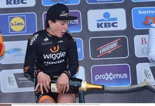 Elisa Longo Borghini lets her champagne off a little too early after winning the Tour of Flanders