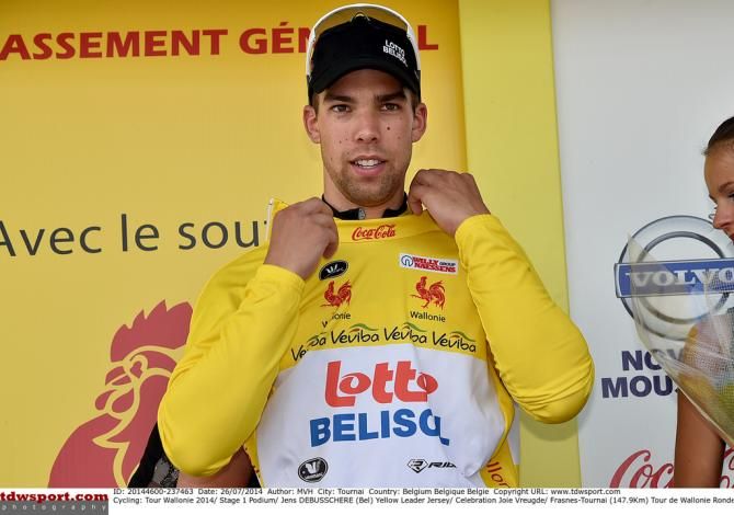 Jens Debusschere (Lotto Belisol) adjusts his yellow jersey