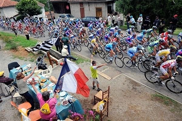 The French take their time when eating and will interrupt the meal for Le Tour, of course.