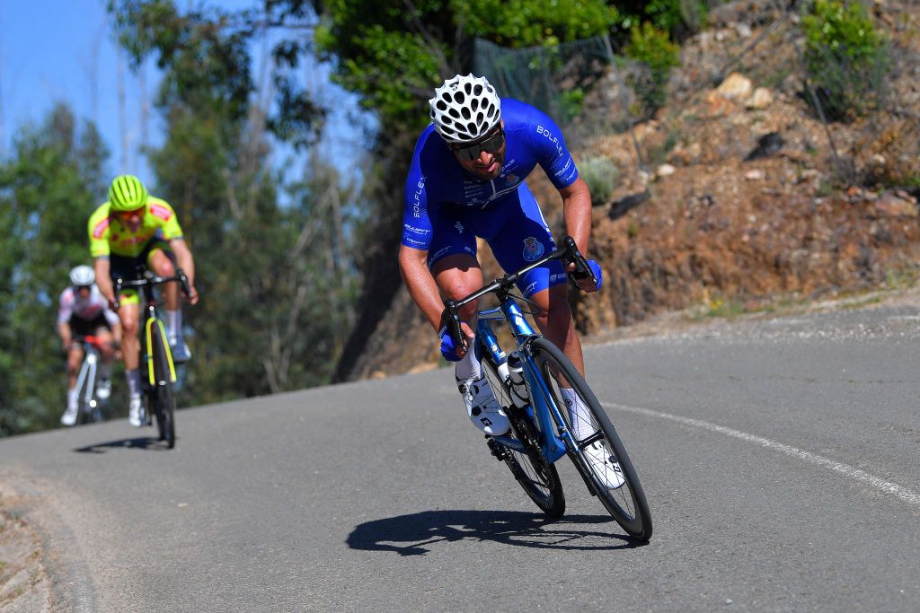 FOIA PORTUGAL MAY 06 Jos Samuel Caldeira of Portugal and Team W52Fc Porto attack on breakaway during the 47th Volta Ao Algarve 2021 Stage 2 a 1828km stage from Sagres to Fia 890m VoltAlgarve VAlgarve2021 on May 06 2021 in Fia Portugal Photo by Luc ClaessenGetty Images