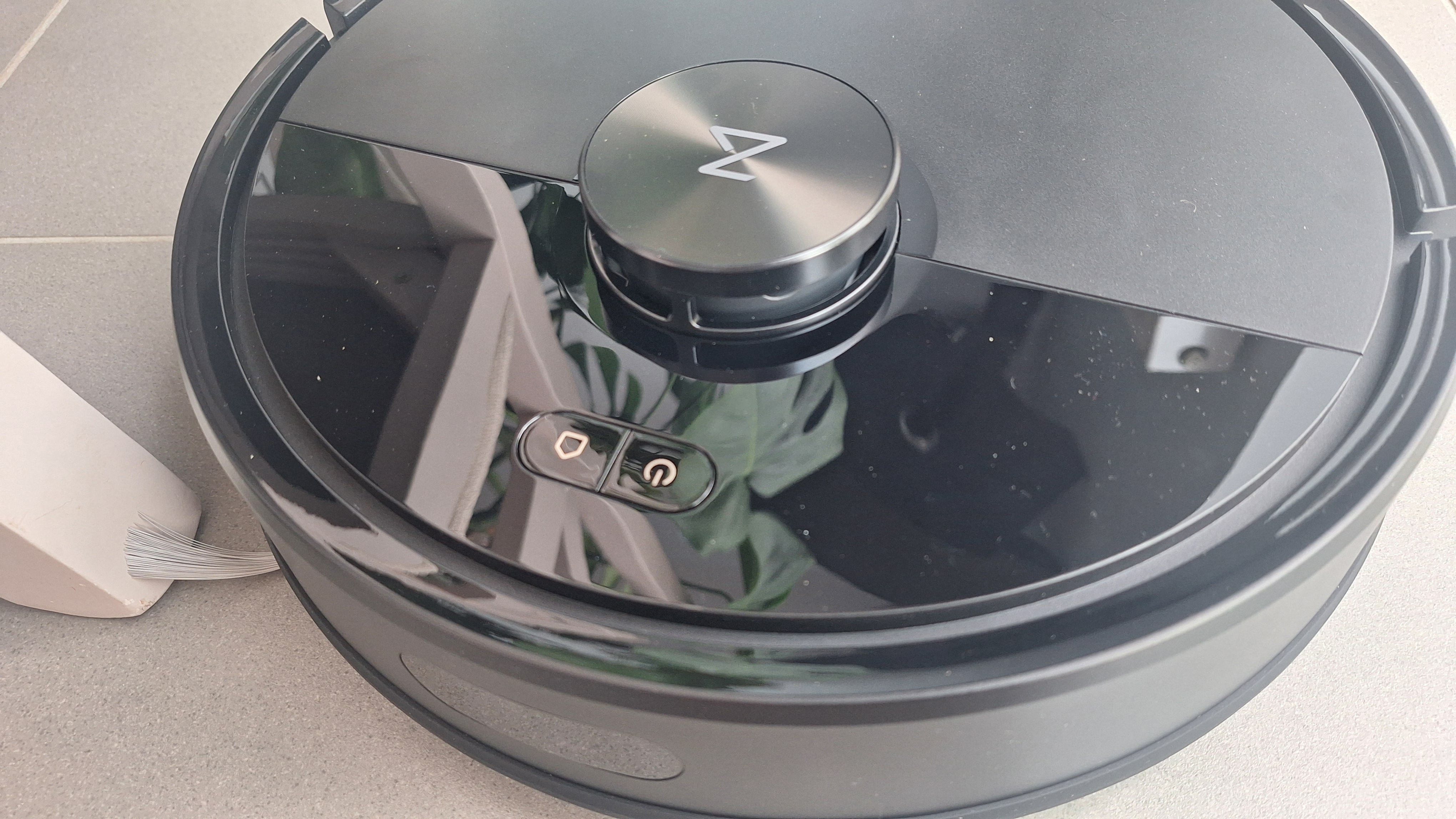 Roborock Q7 M5 robot vacuum on kitchen floor