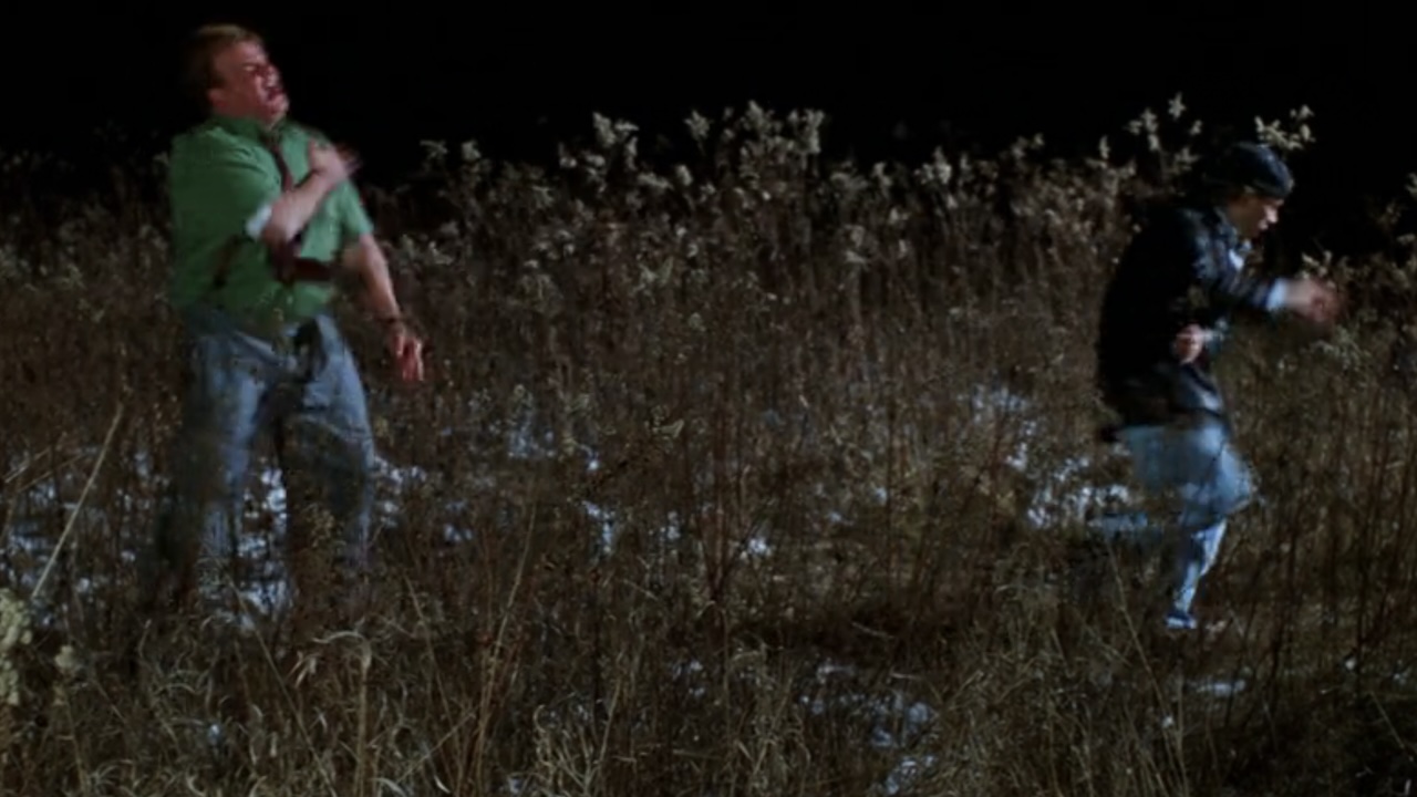 Richard and Tommy running from invisible bees in Tommy Boy.