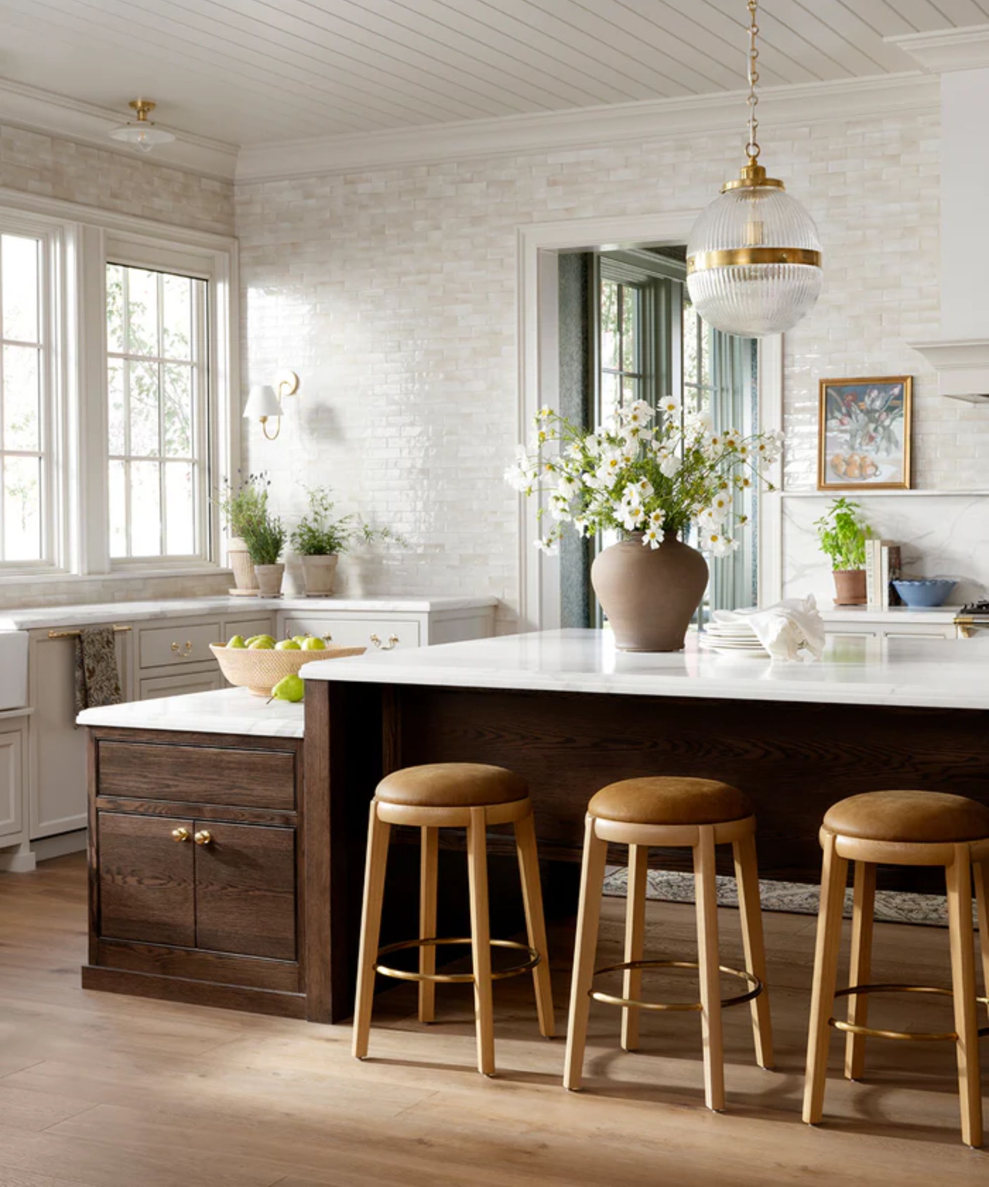 a timeless neutral and dark wood kitchen with floor to ceiling tile designed by shea mcgee and shot for the McGee &amp;amp; Co spring 2026 collection