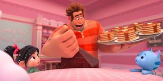 Ralph and Vanellope feed pancakes to a cat in Ralph Breaks the Internet