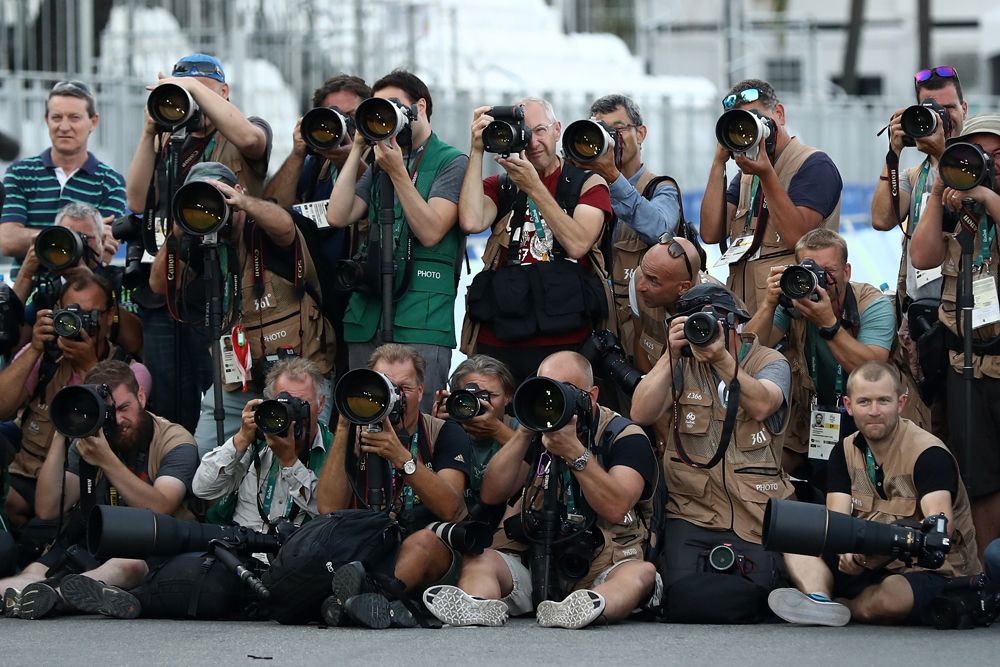 The photographers gather at the finishine in Rio