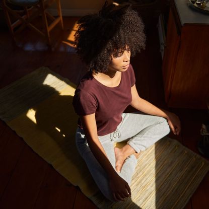 A woman practicing self hypnosis