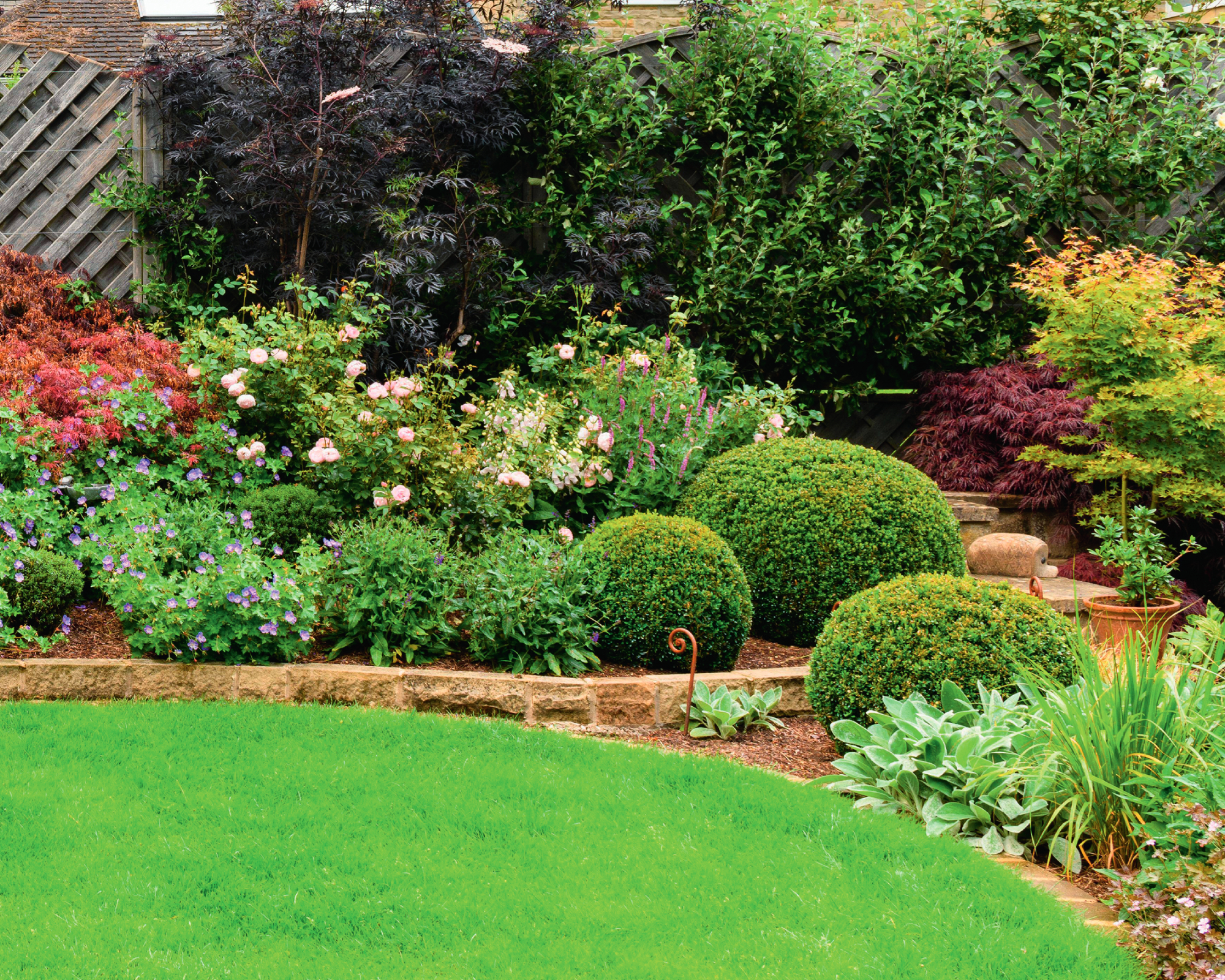 foliage spheres in tidy garden