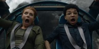 Justice Smith and Bryce Dallas Howard screaming in Jurassic World: Fallen Kingdom