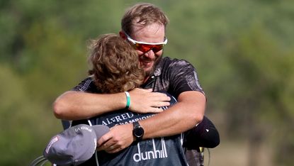 Ockie Strydom hugs his caddie after winning the 2022 Alfred Dunhill Championship