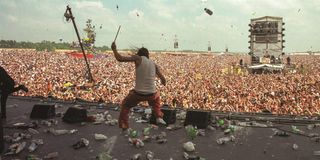 Kid Rock being pelted with bottles at Woodstock '99