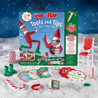 Elf on the Shelf tips and tools kit with a guide book and 15 props