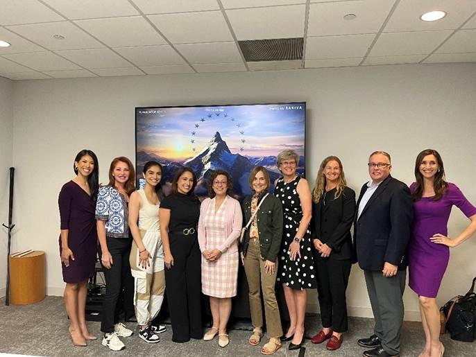 FCC Commissioner Gomez (fifth from left) meets with employees at CBS Miami Channel 4 to discuss consumer access to local news.