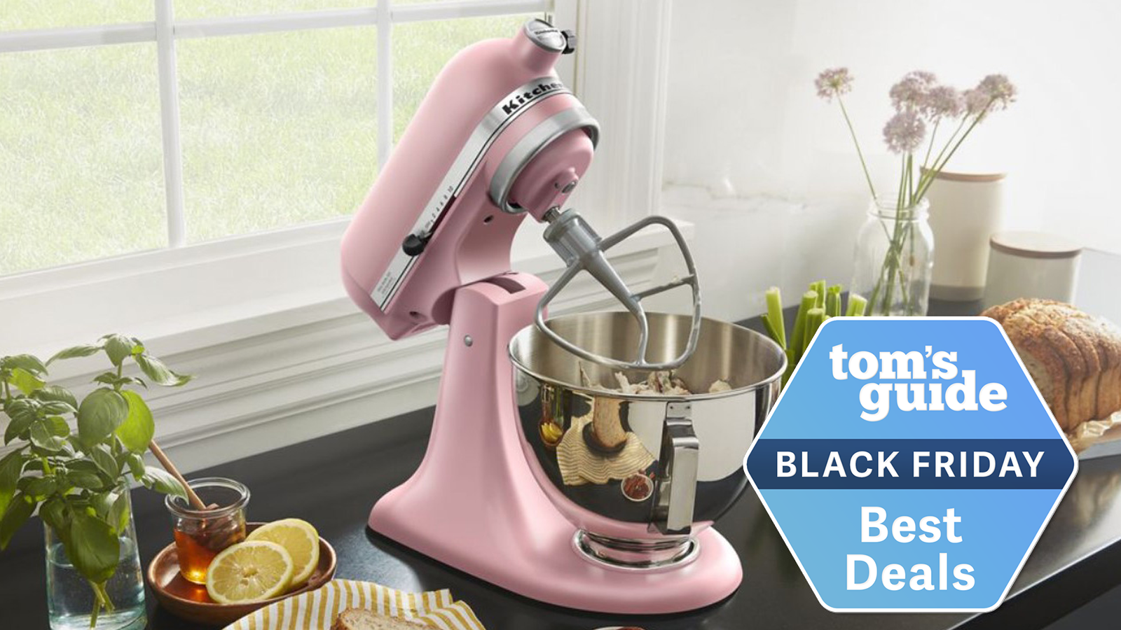 kitchenaid stand mixer in pink with a tom's guide deals tag