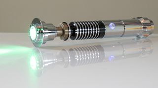 The SabersPro Luke lightsaber ignited without the blade attachment.