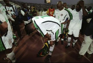 Nigeria players look dejected after losing the 2000 Africa Cup of Nations final against Cameroon on penalties.