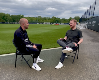 New York City manager/head coach Nick Cushing sits with FourFourTwo Deputy Editor Matthew Ketchell by the training pitch outside at NYCFC's practice facility in Orangeburg, New York