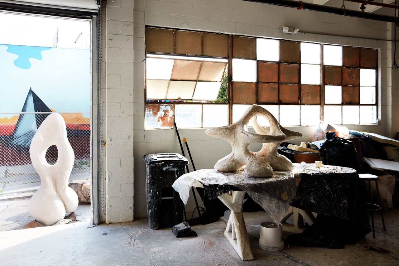 Rogan Gregory&#039;s tete a tete a tete chair sits on a table inside his new Santa Monica studio space.