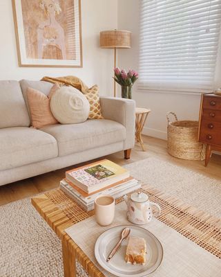 Warm living room with neutral couch