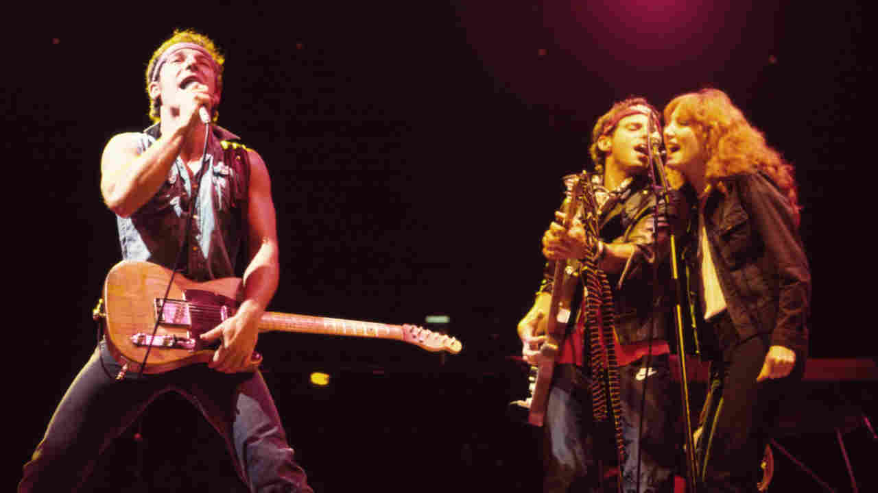 Bruce Springsteen & The E Street Band performing onstage in 1984