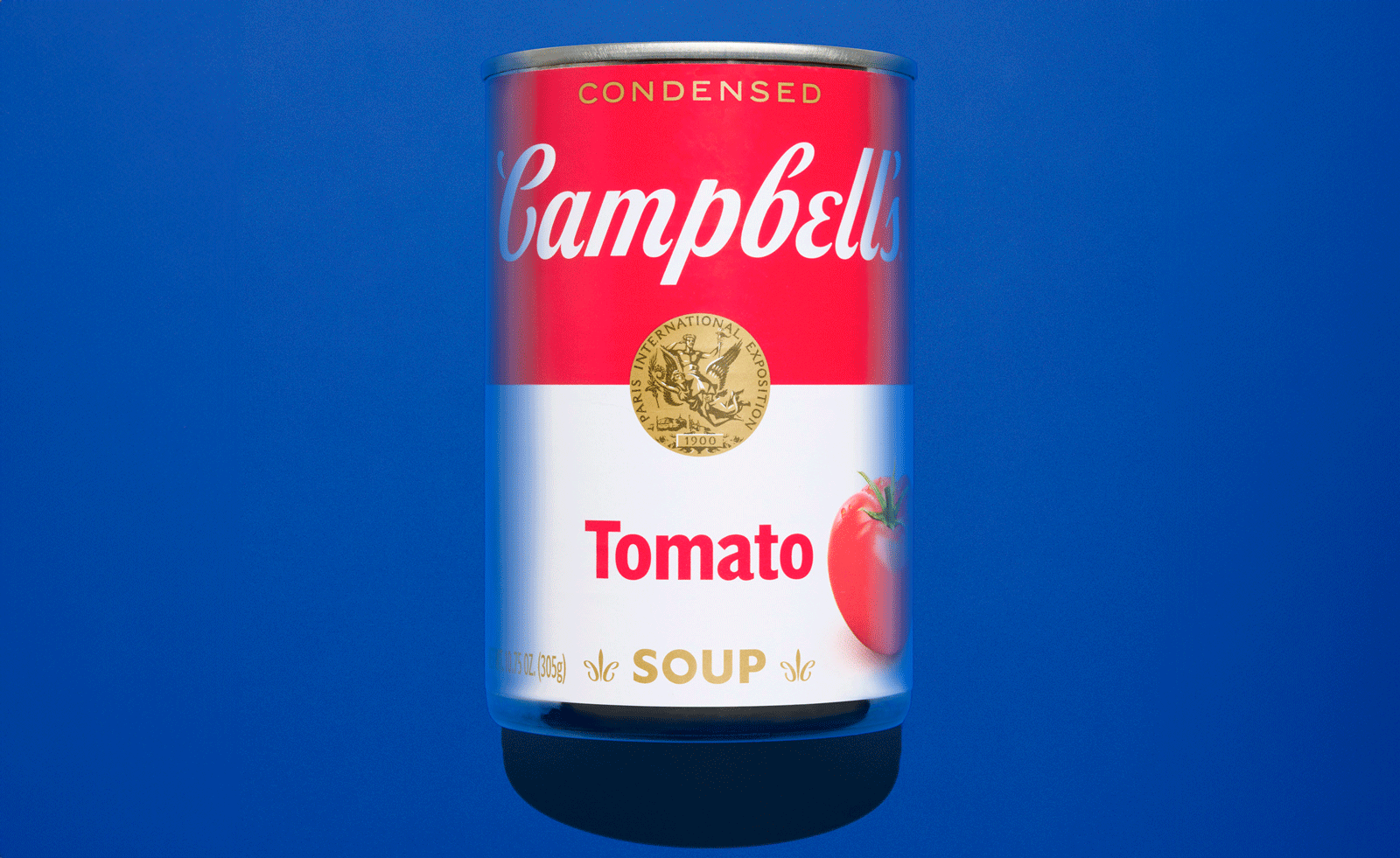 campbells soup can against a blue background