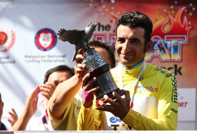 Mirsamad Pourseyedigolakhour with the winners trophy