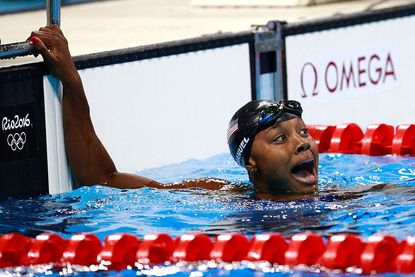 U.S. swimmer Simone Manuel wins gold in the Women's 100m freestyle