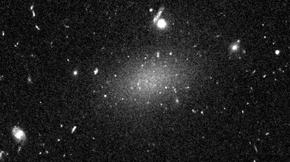 The Dragonfly 44 galaxy looks like a smear across space.