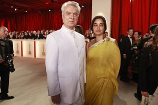 David Byrne and Mala Gaonkar attend the 95th Annual Academy Awards on March 12, 2023 in Hollywood, California.