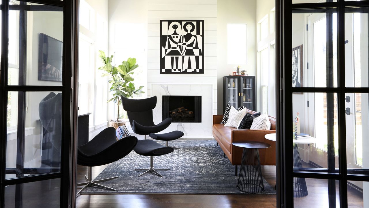 Mid century modern living room with retro chair and black and white decor