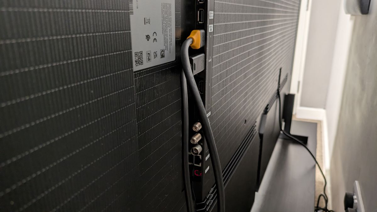 Samsung S99H ports on rear panel with two HDMI cables plugged in