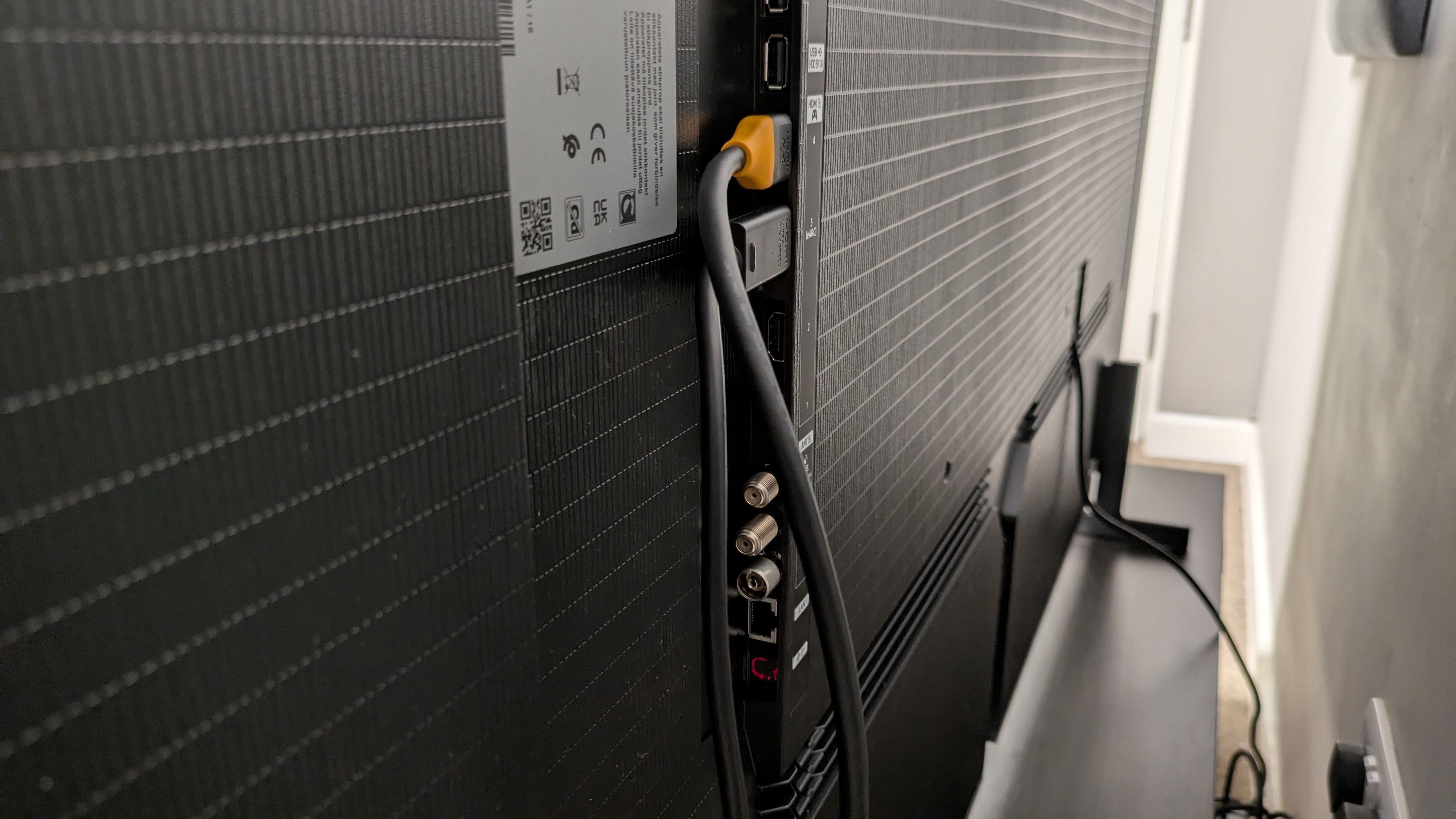 Samsung S99H ports on rear panel with two HDMI cables plugged in