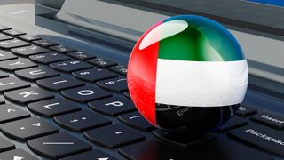 UAE flag on laptop keyboard