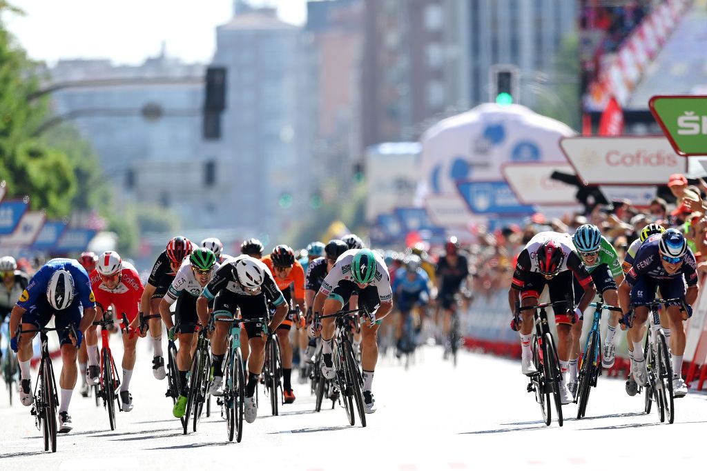 BURGOS SPAIN AUGUST 15 Fabio Jakobsen of Netherlands and Team Deceuninck QuickStep Michael Matthews of Australia and Team BikeExchange Alex Aranburu Deba of Spain and Team Astana Premier Tech green points jersey Juan Sebastin Molano Benavides of Colombia and UAE Team Emirates and Jasper Philipsen of Belgium and Team AlpecinFenix sprint to win during the 76th Tour of Spain 2021 Stage 2 a 1667km stage from Caleruega Monasterio de Santo Domingo de Guzmn to Burgos Gamonal lavuelta LaVuelta21 CapitalMundialdelCiclismo on August 15 2021 in Burgos Spain Photo by Stuart FranklinGetty Images