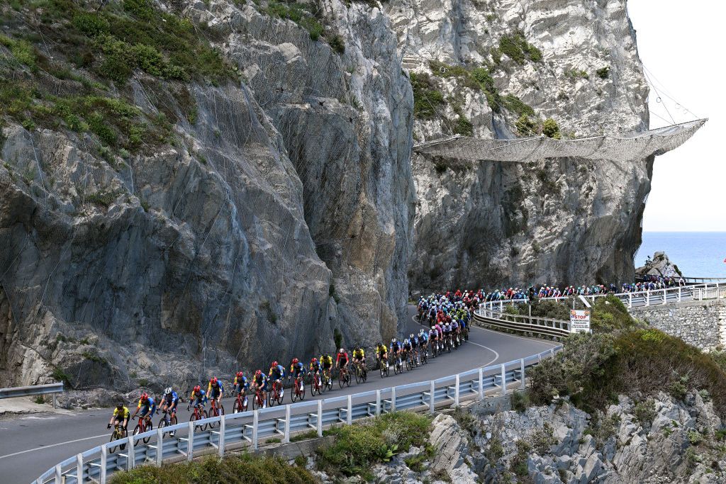 ANDORA ITALY MAY 07 Jan Tratnik of Slovenia and Team Visma Lease a Bike Amanuel Ghebreigzabhier of Eritrea and Team Lidl Trek and Pieter Serry of Belgium and Team Soudal QuickStep lead the peloton competing close to the Mediterranean seaside during the 107th Giro dItalia 2024 Stage 4 a 190km stage from Acqui Terme to Andora UCIWT on May 07 2024 in Andora Italy Photo by Tim de WaeleGetty Images