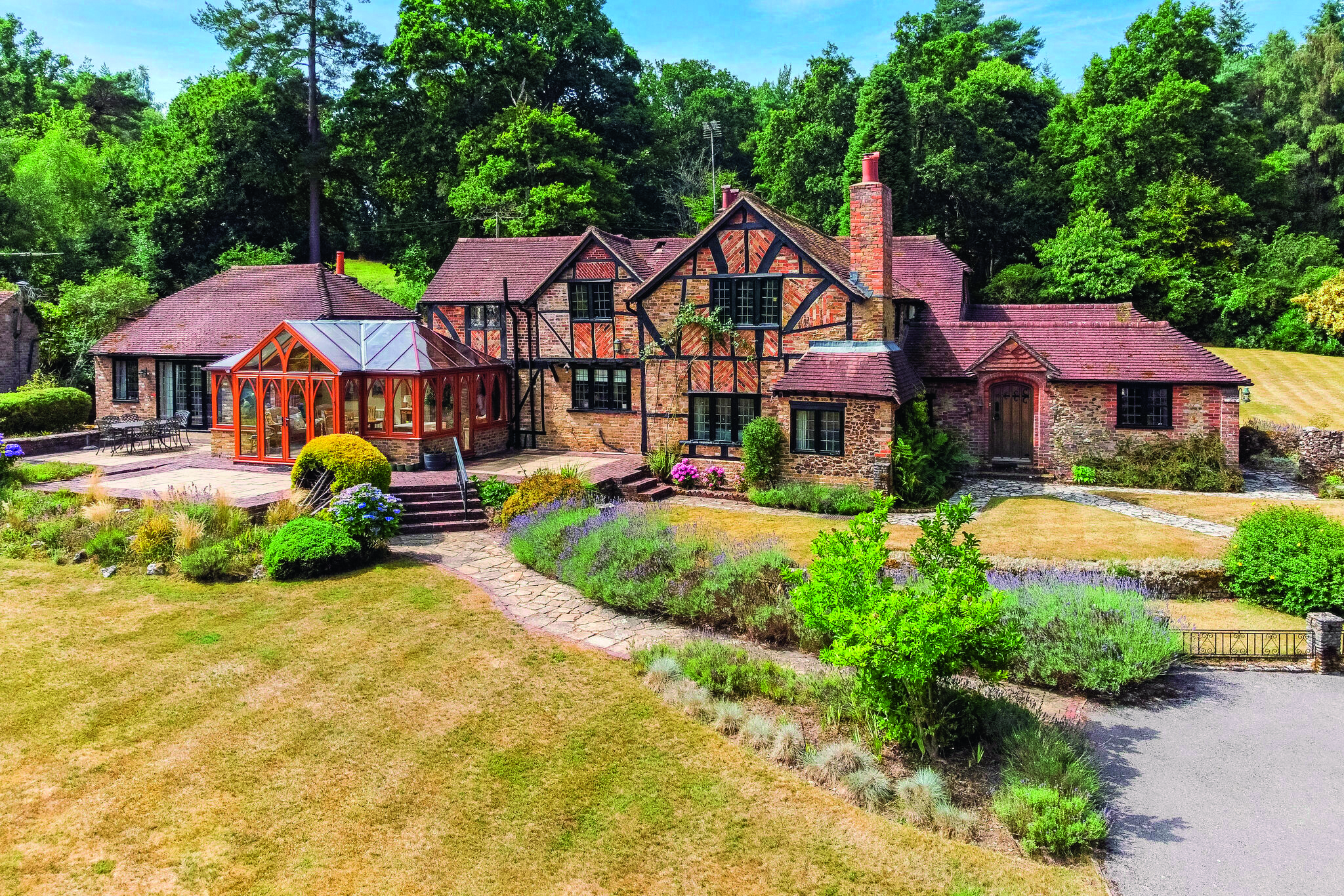 Front view of the tudor red brick building that is Larchfield