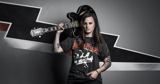 Emily Wolfe with her new signature Epiphone, the Sheraton Stealth