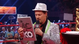 Chris Jericho holding the "List of KO" just before being attacked by Kevin Owens