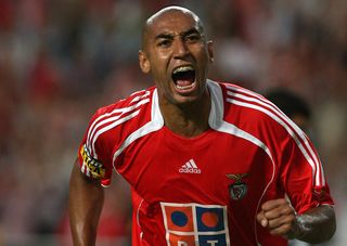 Benfica's Luisao celebrates a goal against Nacional in September 2006.