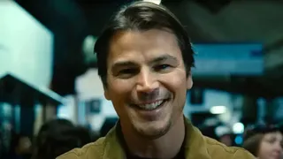 Josh Hartnett smiles and looks into the camera in 'Trap'