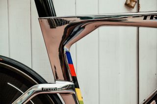 A polished chrome Trek Speed Concept commemorating Ellen Van Dijk's hour record and world championship win