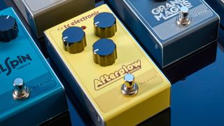 A TC Electronic Afterglow chorus pedal lying amongst various other TC Electronic guitar pedals