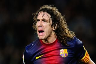 Carles Puyol in action for Barcelona against Deportivo La Coruña in 2013.
